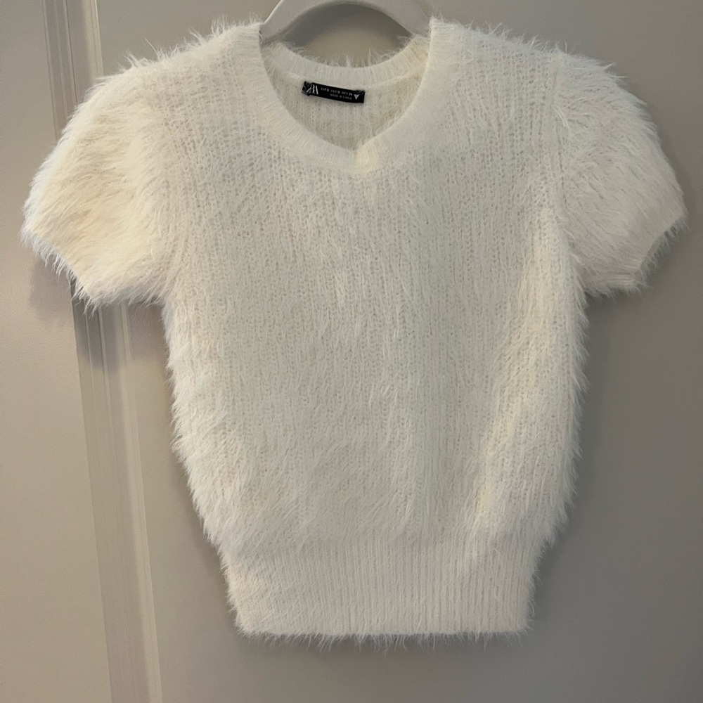 Zara white fuzzy top.